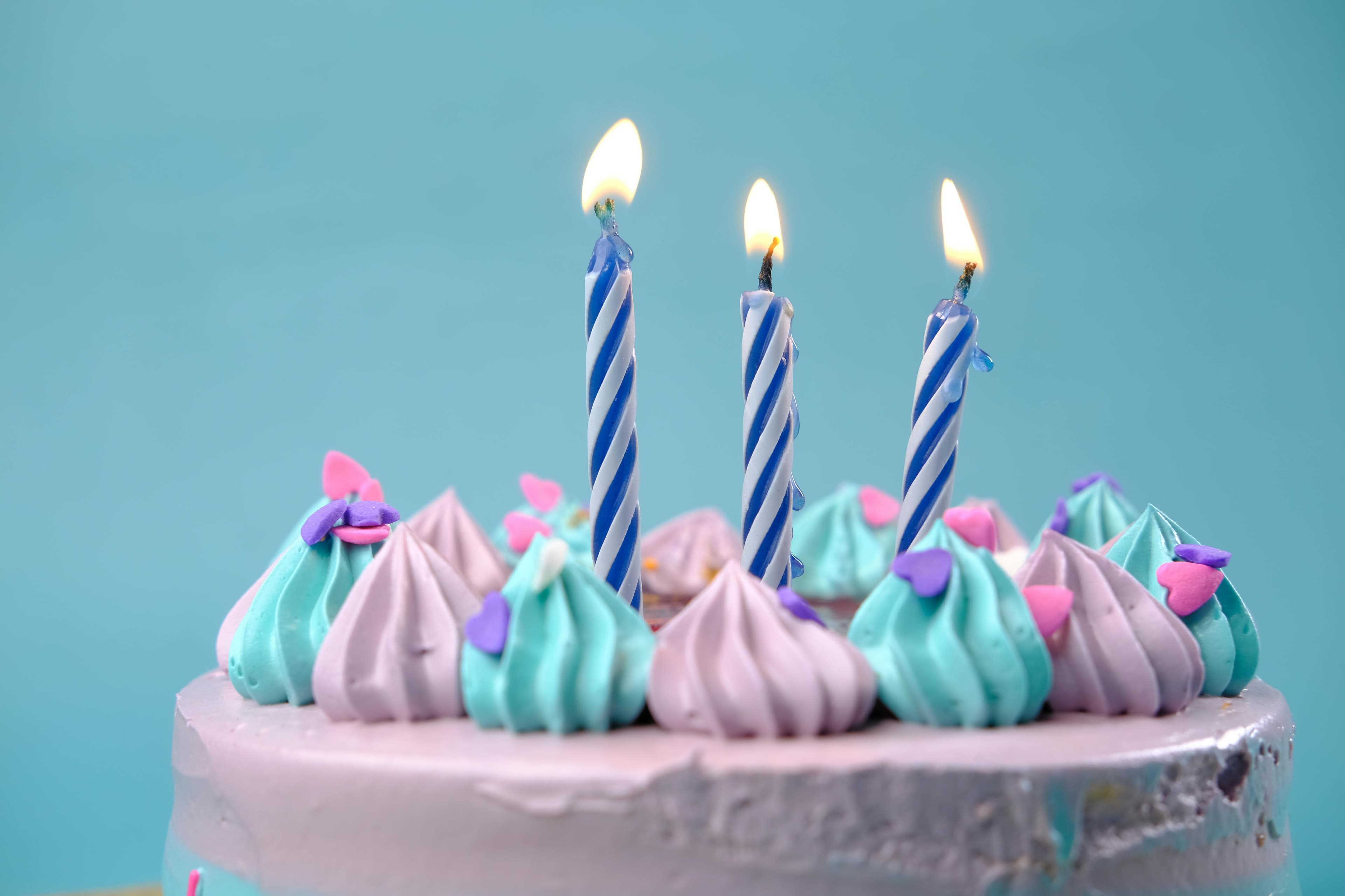 A beautiful and delicious-looking cake on a stand.
